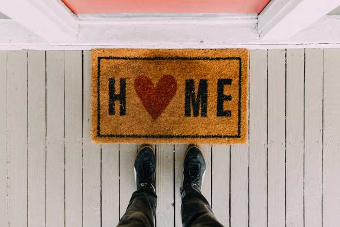A welcome mat saying Home